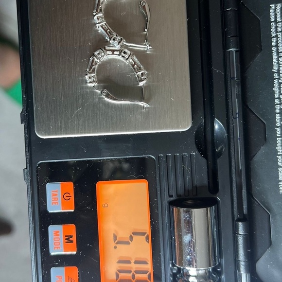 Elegant Silver Hoop Earrings - Picture 3 of 3